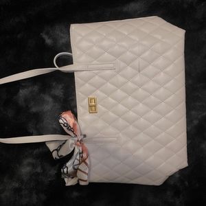 White purse with fancy bow